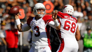 Jared Veldheer protecting his quarterback on the sideline